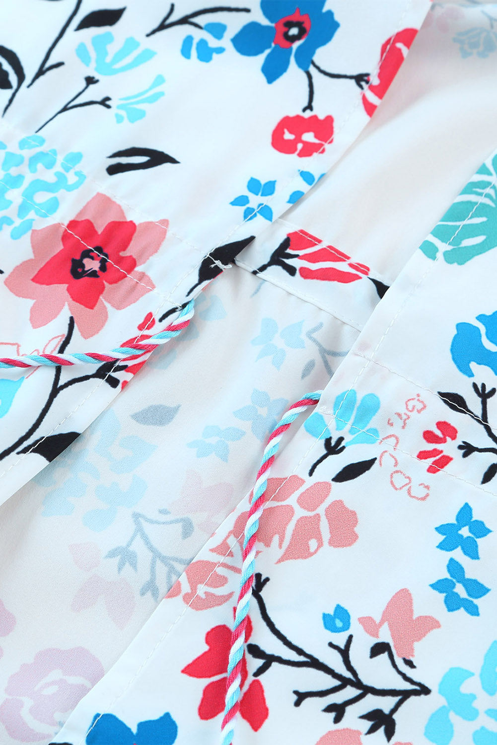 Veelkleurige kimono met lange mouwen en kwastjes