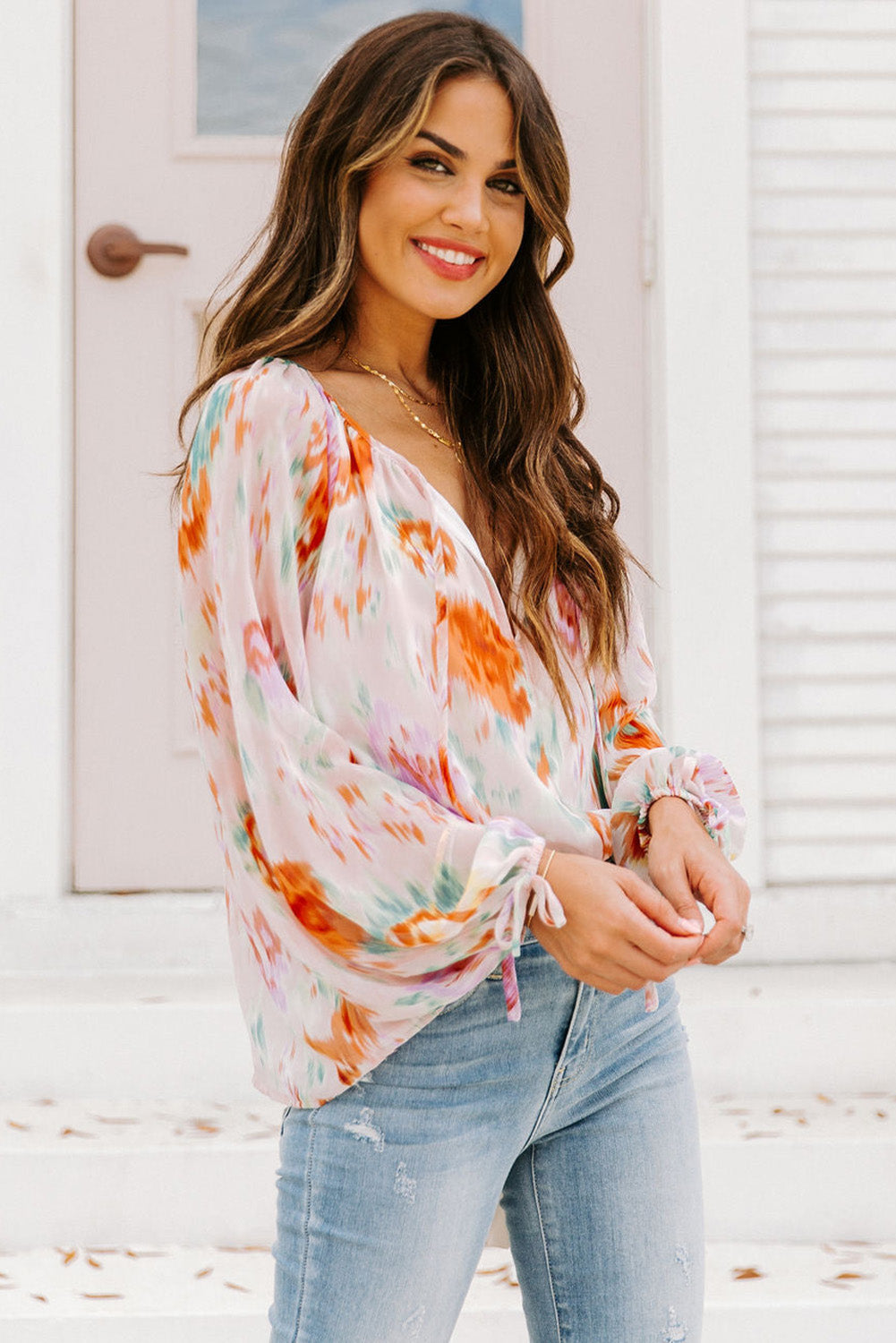 Blouse met veelkleurige abstracte print en splithals en pofmouwen