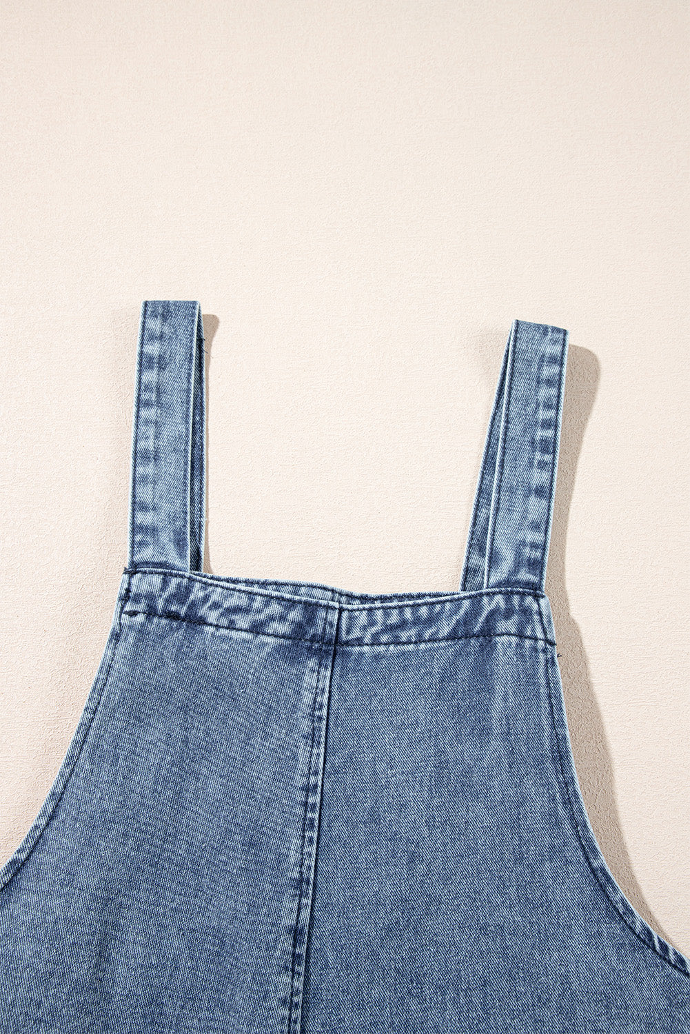 Steenblauwe bedroefde slabbetje zak wijd been denim in het algemeen