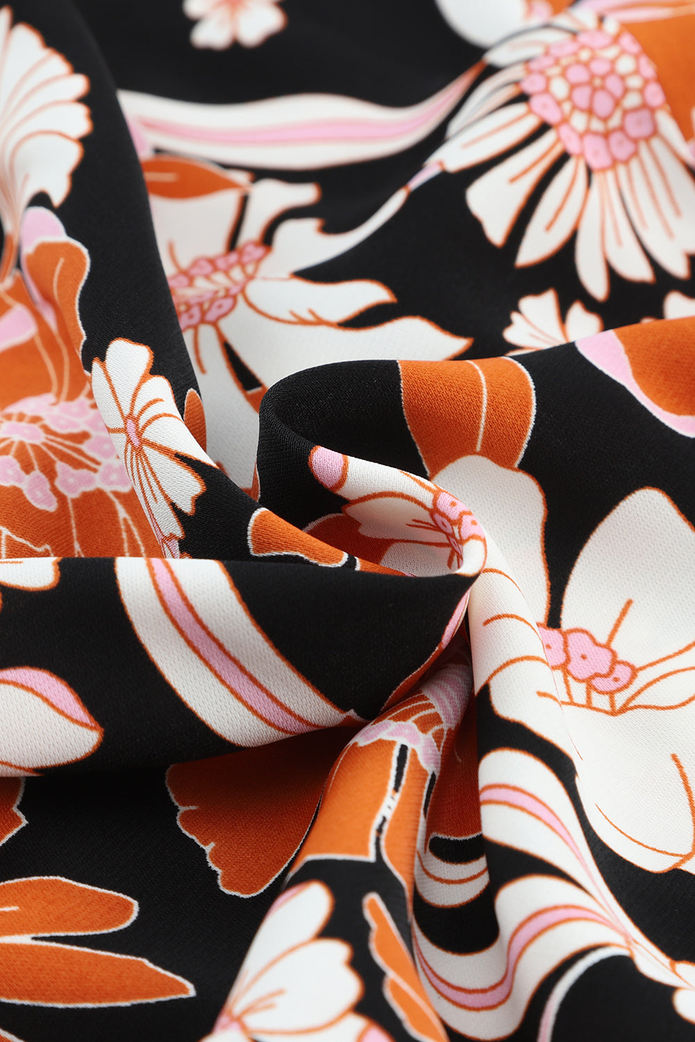 Bruine babydollblouse met 3/4 mouwen en bloemenprint