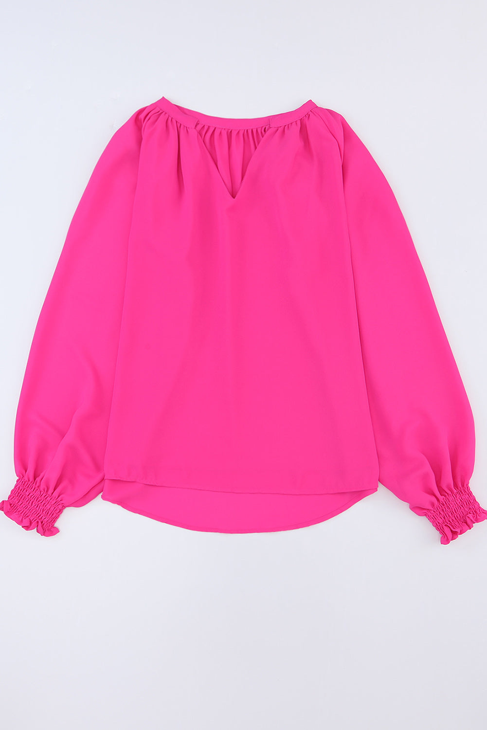 Roze geplooide blouse met V-hals en gezwollen mouwen