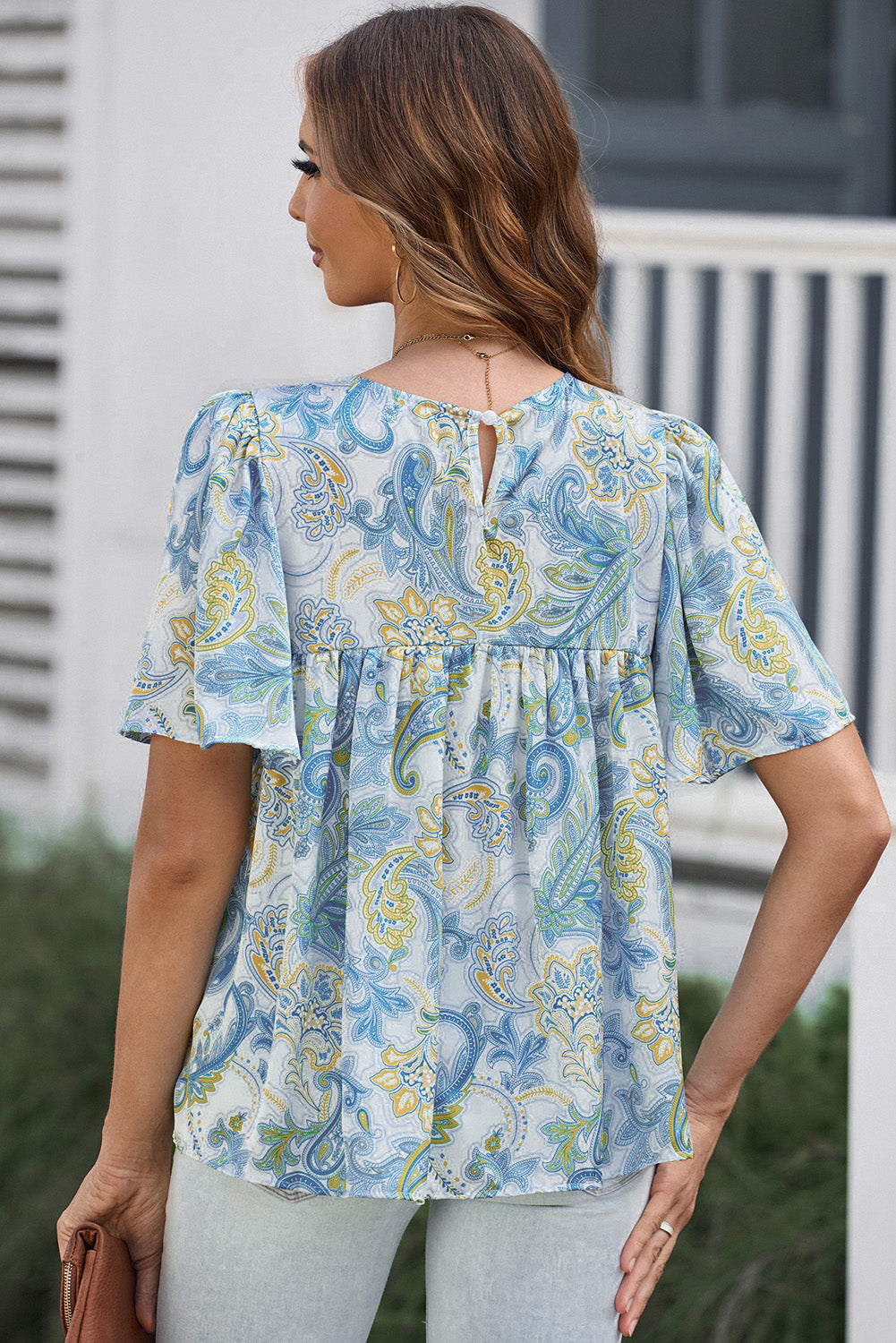 Hemelsblauwe losse blouse met paisleyprint en wijde mouwen