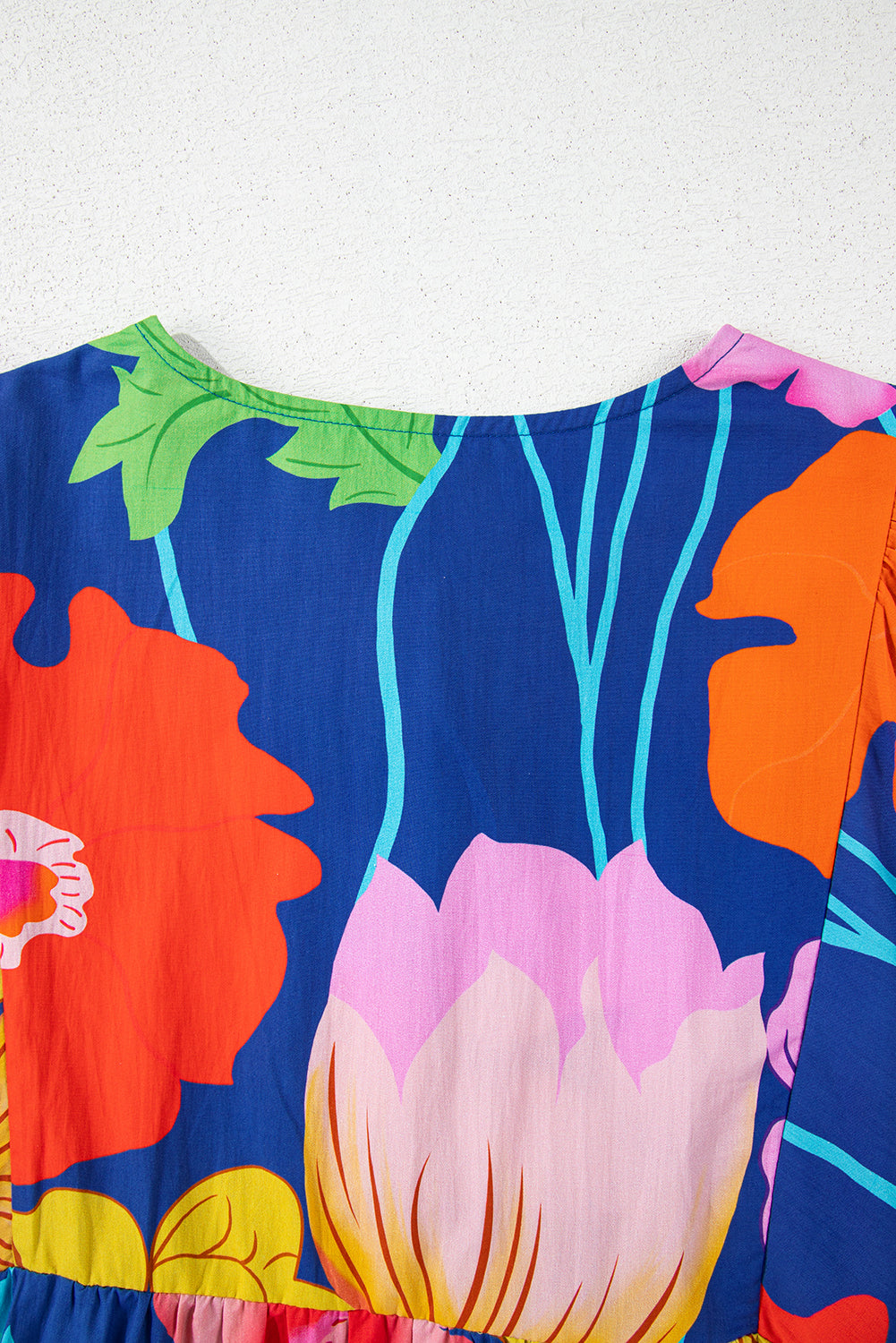 Donkerblauwe bloemenprint split nek babydoll jurk