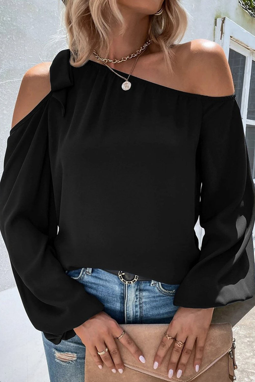 Zwart geknoopte asymmetrische off-shoulder blouse