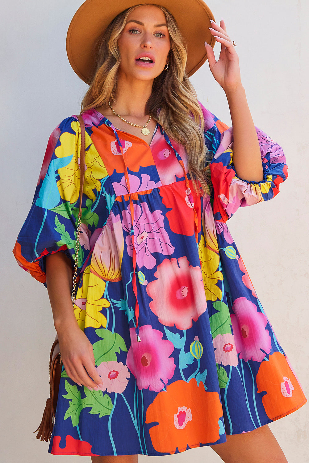 Donkerblauwe bloemenprint split nek babydoll jurk