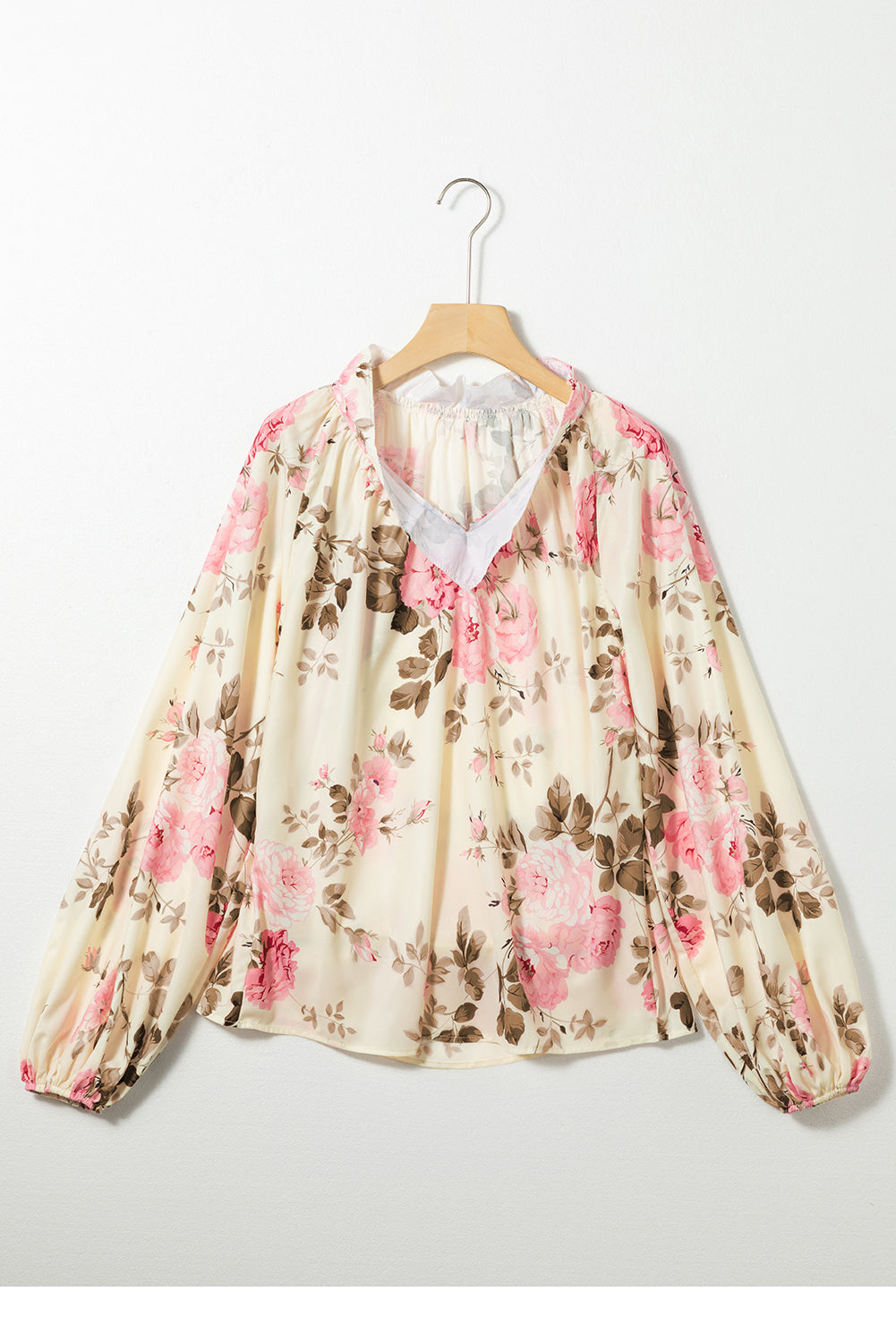 Beige blouse met V-hals met bloemenprint en lantaarnmouwen