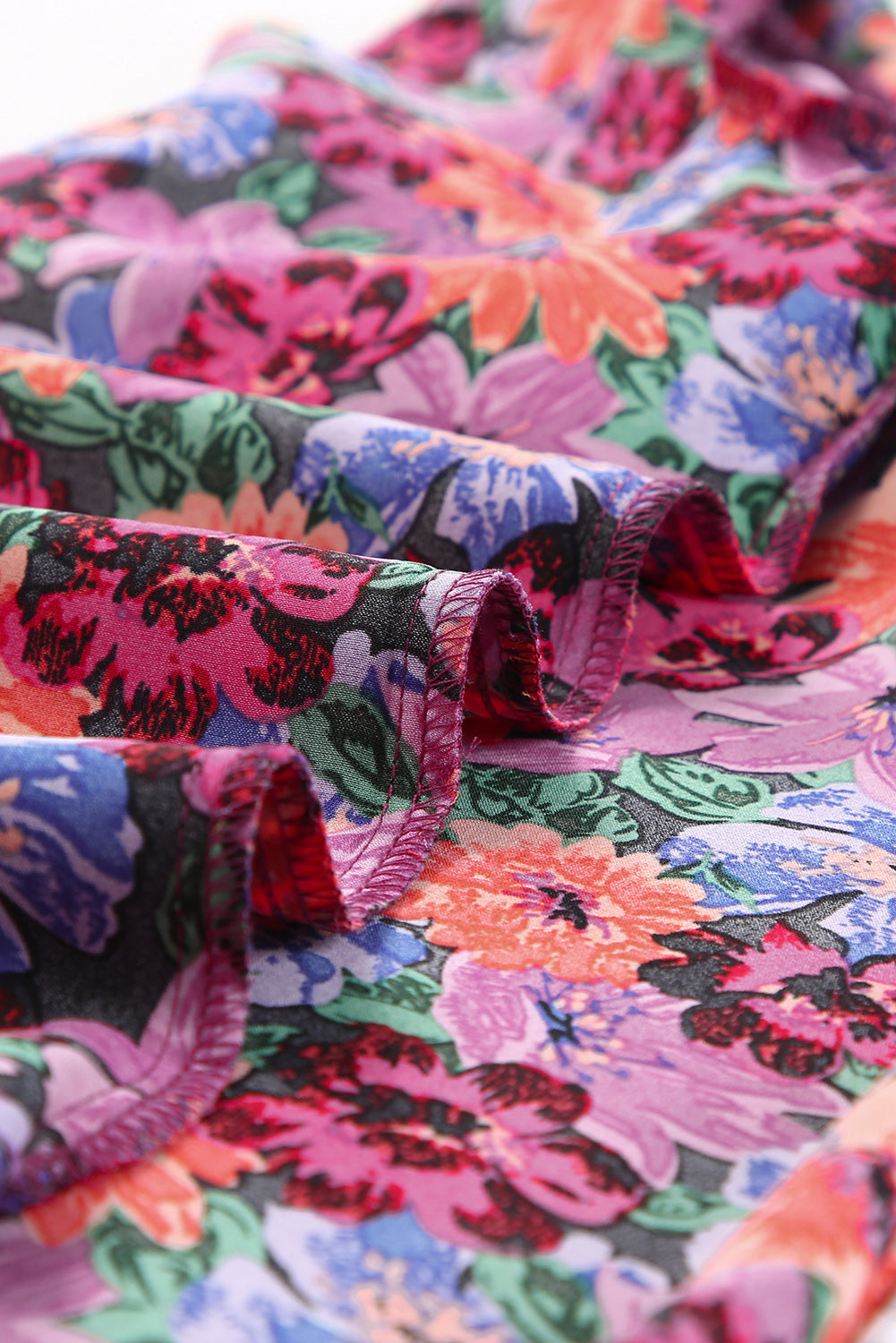 Blouse met veelkleurige bloemenprint en ronde hals en pofmouwen