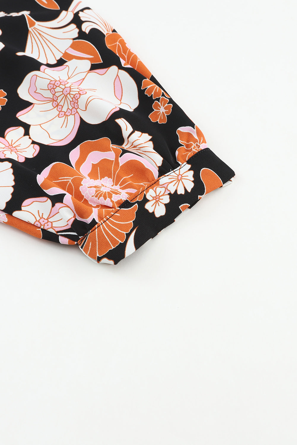 Bruine babydollblouse met 3/4 mouwen en bloemenprint