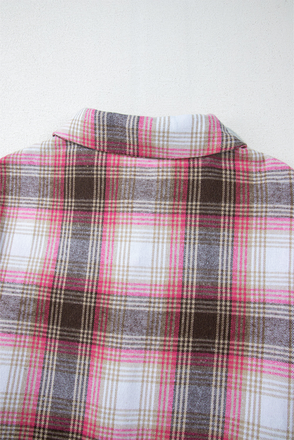 Roze geruite klepzak met knoopsluiting
