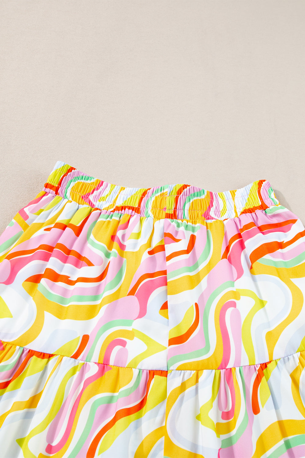 Roze gelaagde maxirok met abstracte print
