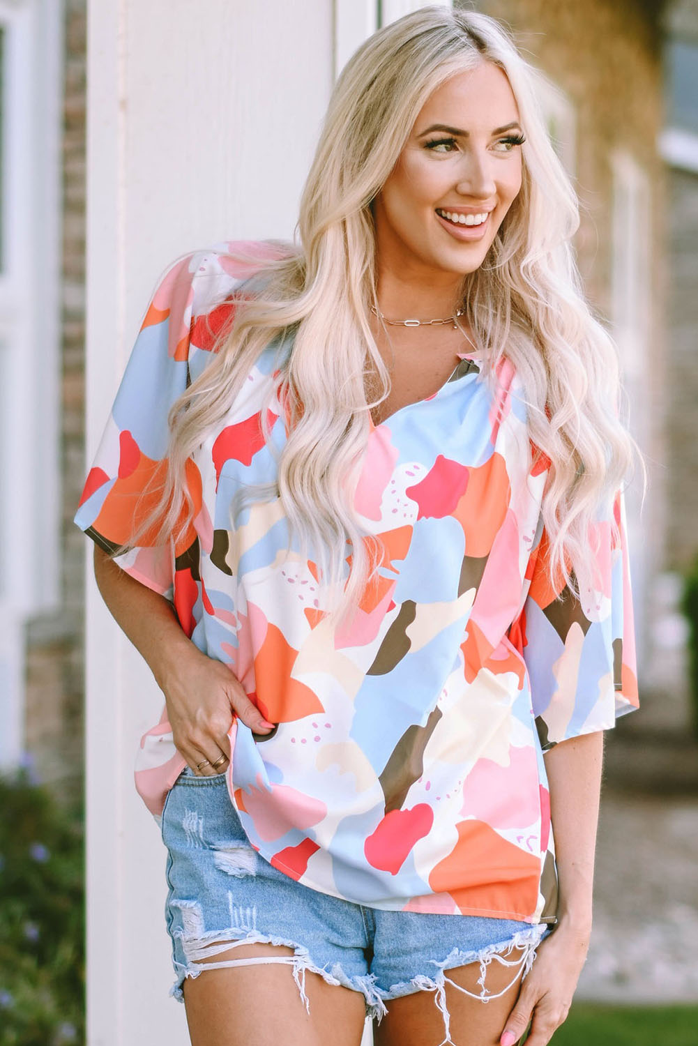 Blouse met veelkleurige bloemenprint, V-hals en halve mouw