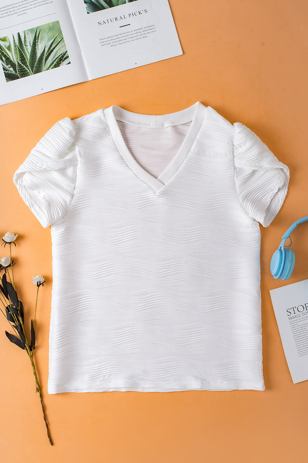 Witte effen kleur getextureerde top met V-hals en korte mouwen