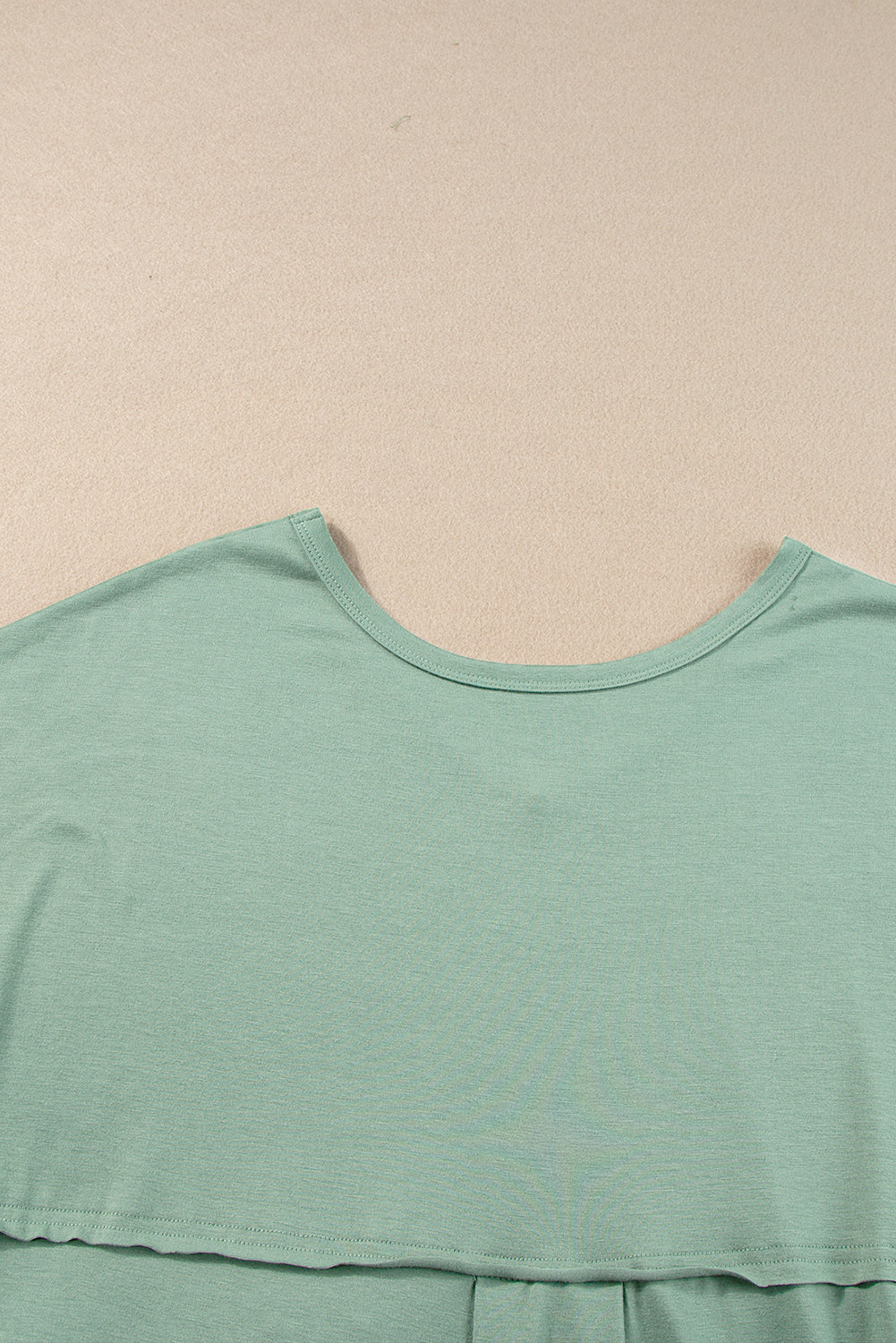 Grasgroene maxi-T-shirtjurk met V-hals en verborgen zaksplitten