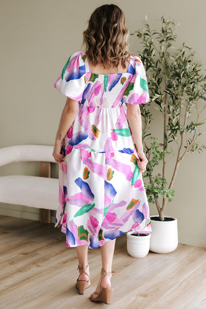 Paarse midi-jurk met gesmokte achterkant en pofmouwen met abstracte print