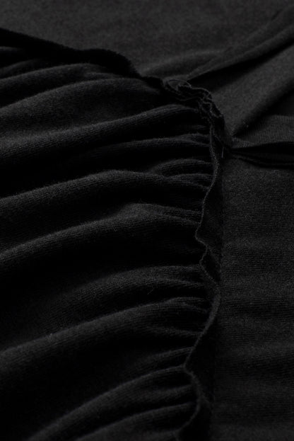 Zwarte babydoll-top met kanten mouwen en V-hals en ruches