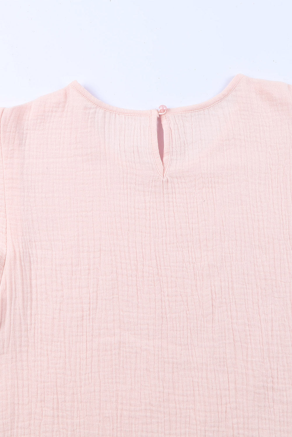 Roze getextureerde gelaagde blouse met korte mouwen en ruches