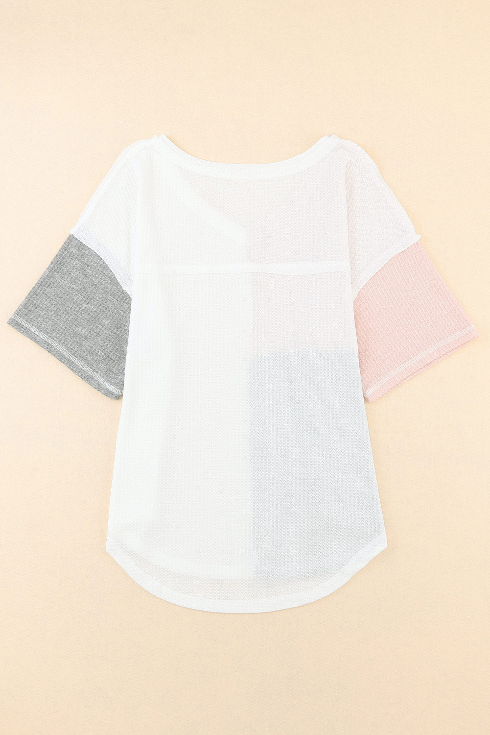 Oversized top met veelkleurige wafelkleurblokken en wijde mouwen