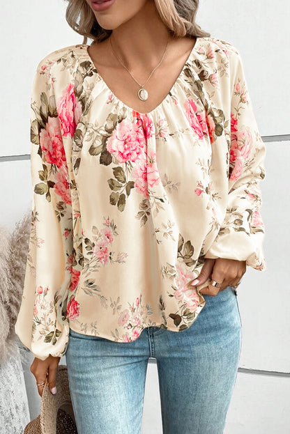 Beige blouse met V-hals met bloemenprint en lantaarnmouwen