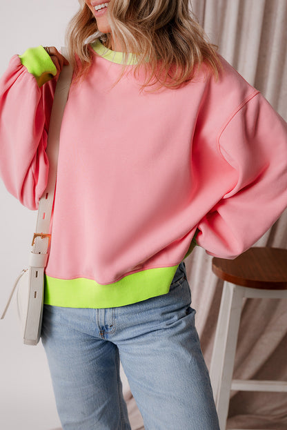 Roze sweatshirt met colorblock-bubbelmouwen
