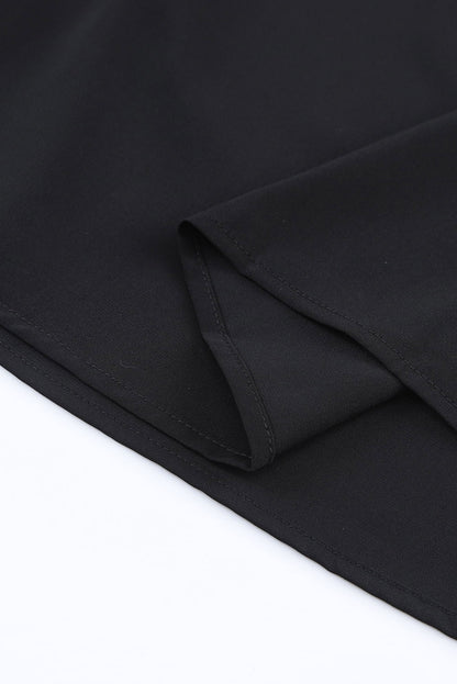 Zwart geknoopte asymmetrische off-shoulder blouse