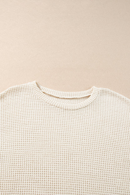 Beige korte tweedelige set met franjes en getextureerde rand