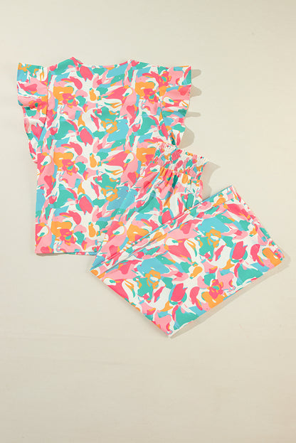 Top met gebloemde mouwen, gesmokte broek met wijde pijpen