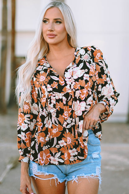 Bruine babydollblouse met 3/4 mouwen en bloemenprint