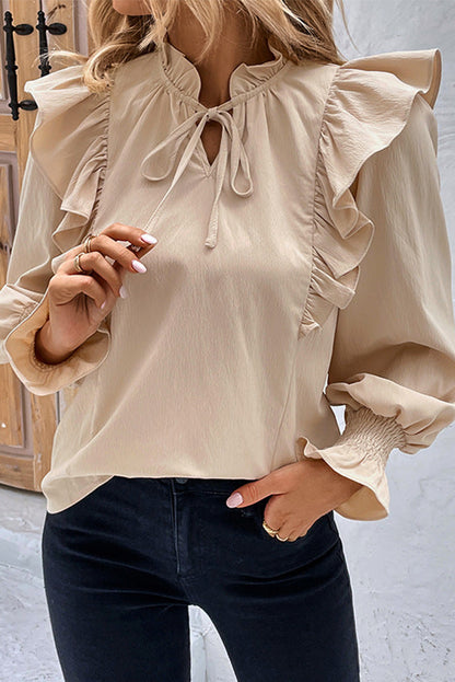 Kaki blouse met ruches en bubbelmouwen met veters