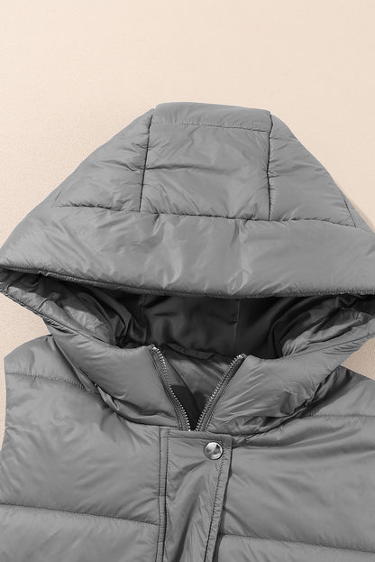 Donkergrijze lange gewatteerde vestjas met capuchon