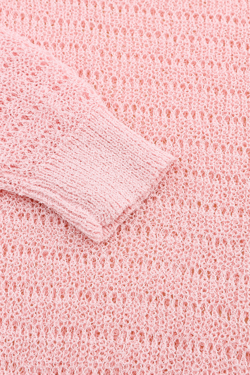 Roze gebreide top met ronde hals en lange mouwen