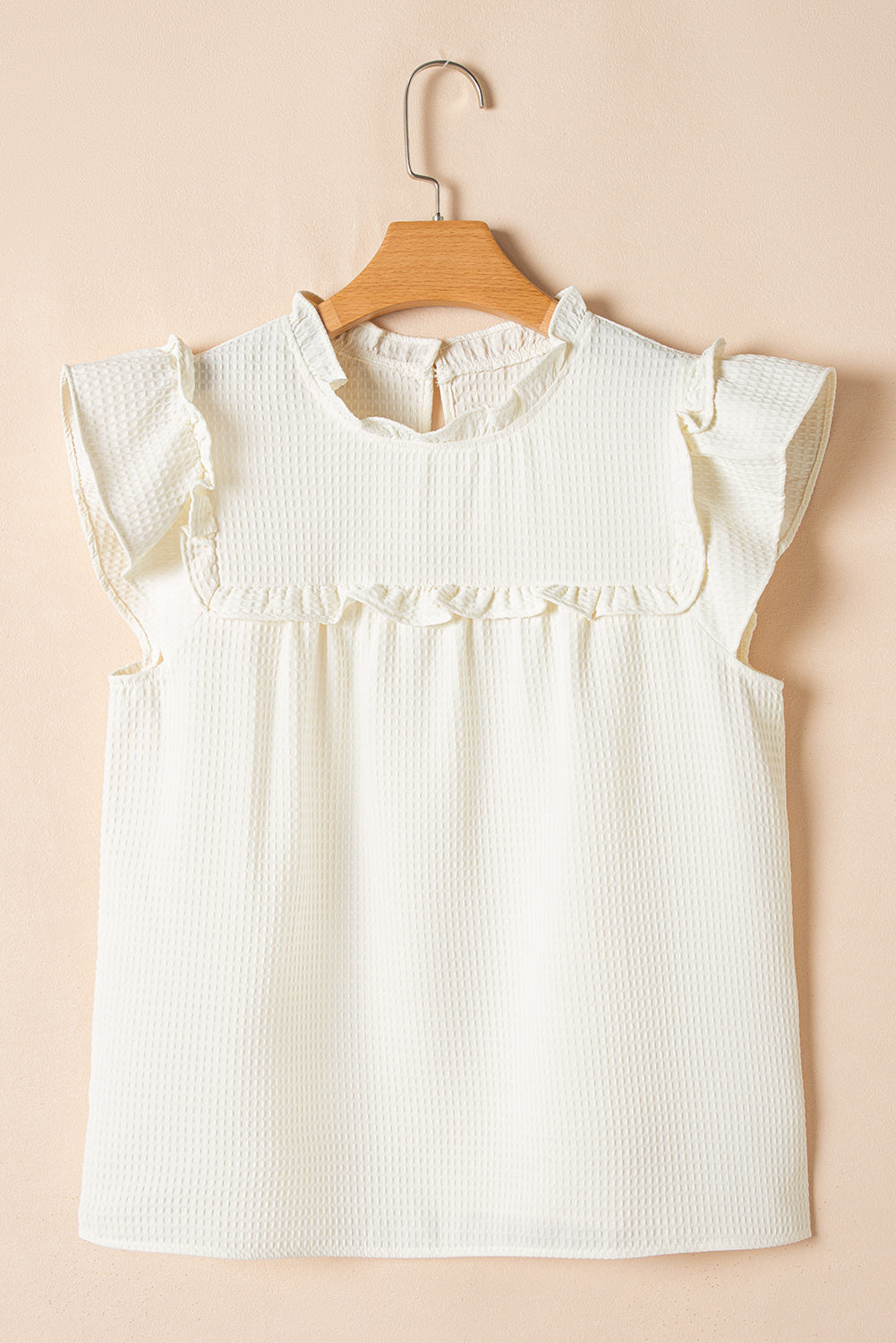 Witte vaste kleur ruches trim wafel gebreide blouse