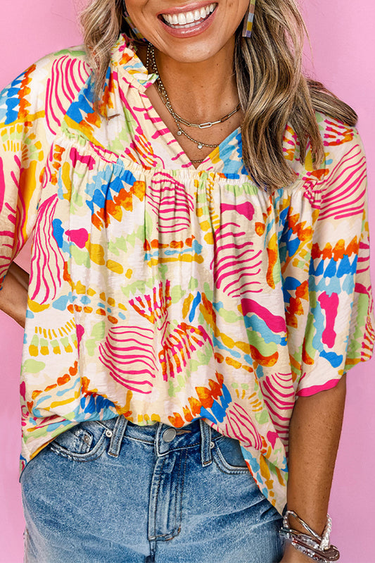 Oranje abstracte gedrukte gebuierde bubbel halve mouw v nek blouse
