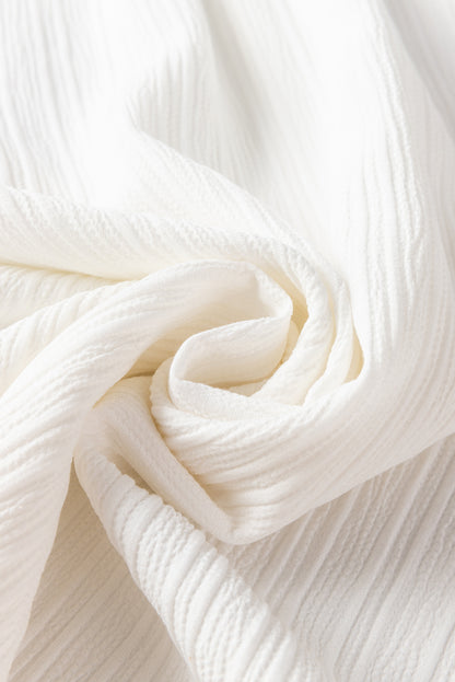 Witte blouse met ruches en rimpelige bubbelmouwen met ruches