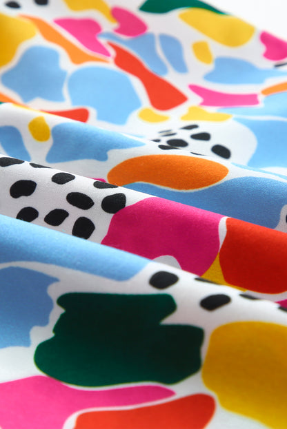 Top met hoge hals en fladdermouwen met veelkleurige abstracte print