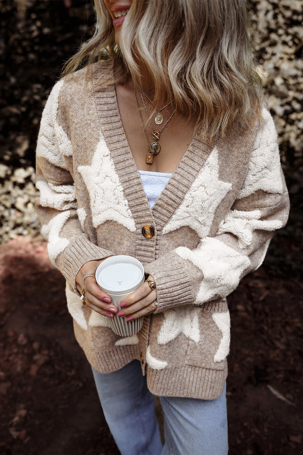 Kaki vest met sherpa-sweater met sterrenpatroon en zakken