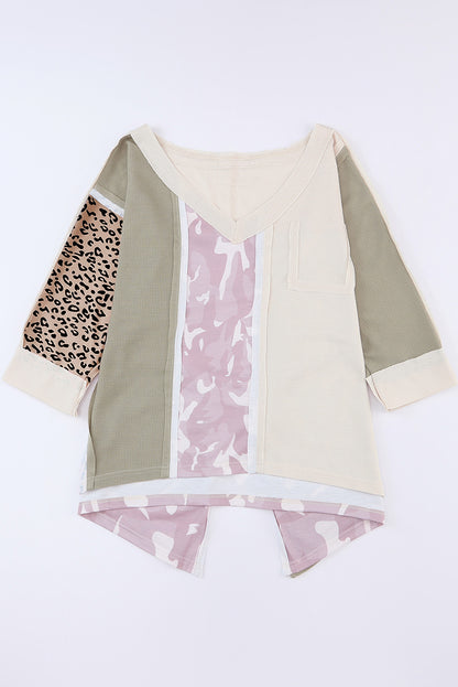 Veelkleurige oversized top met zichtbare naden en patchwork