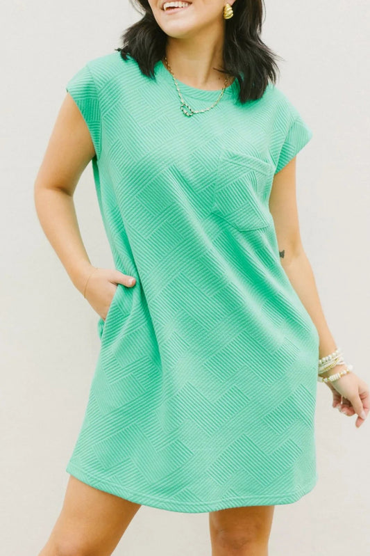 Mintgroene T-shirtjurk met getextureerde kapmouw