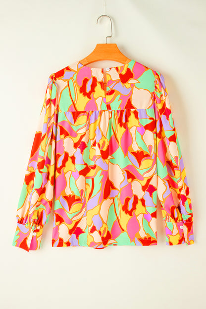 Gele blouse met abstracte print en pofmouwen