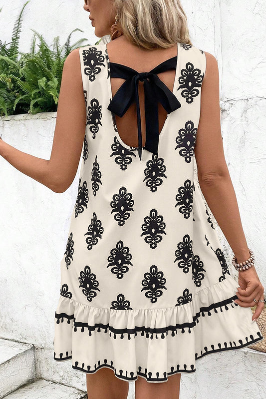 Beige geometrische gedrukte mouwloze holle bowknot back mini -jurk