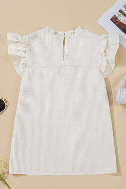 Witte vaste kleur ruches trim wafel gebreide blouse