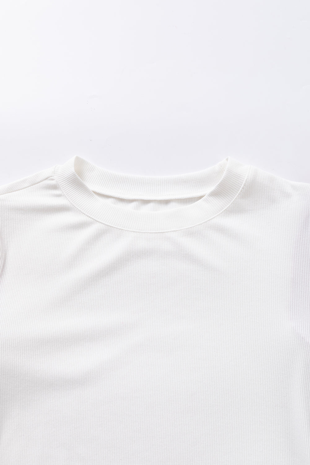 Witte contrasterende tweed top met pofmouwen