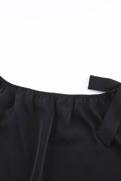 Zwart geknoopte asymmetrische off-shoulder blouse