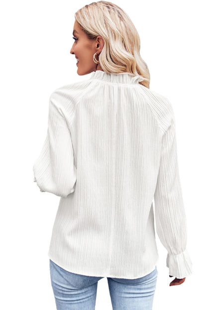 Witte blouse met ruches en rimpelige bubbelmouwen met ruches