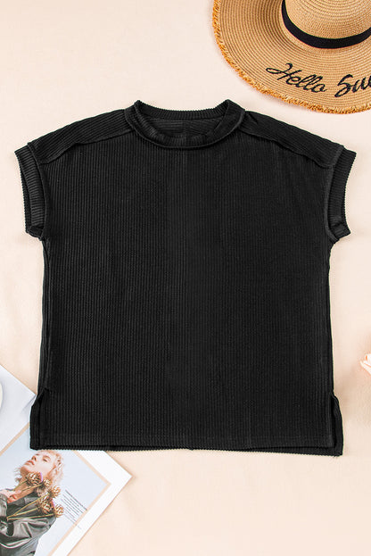 Zwart getextureerd gebreid T-shirt met zichtbare stiksels