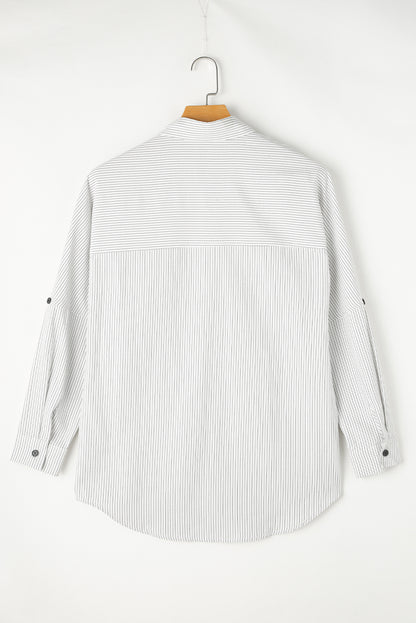 Zwart gestreept lang shirt met oprolbare mouwen en zakken