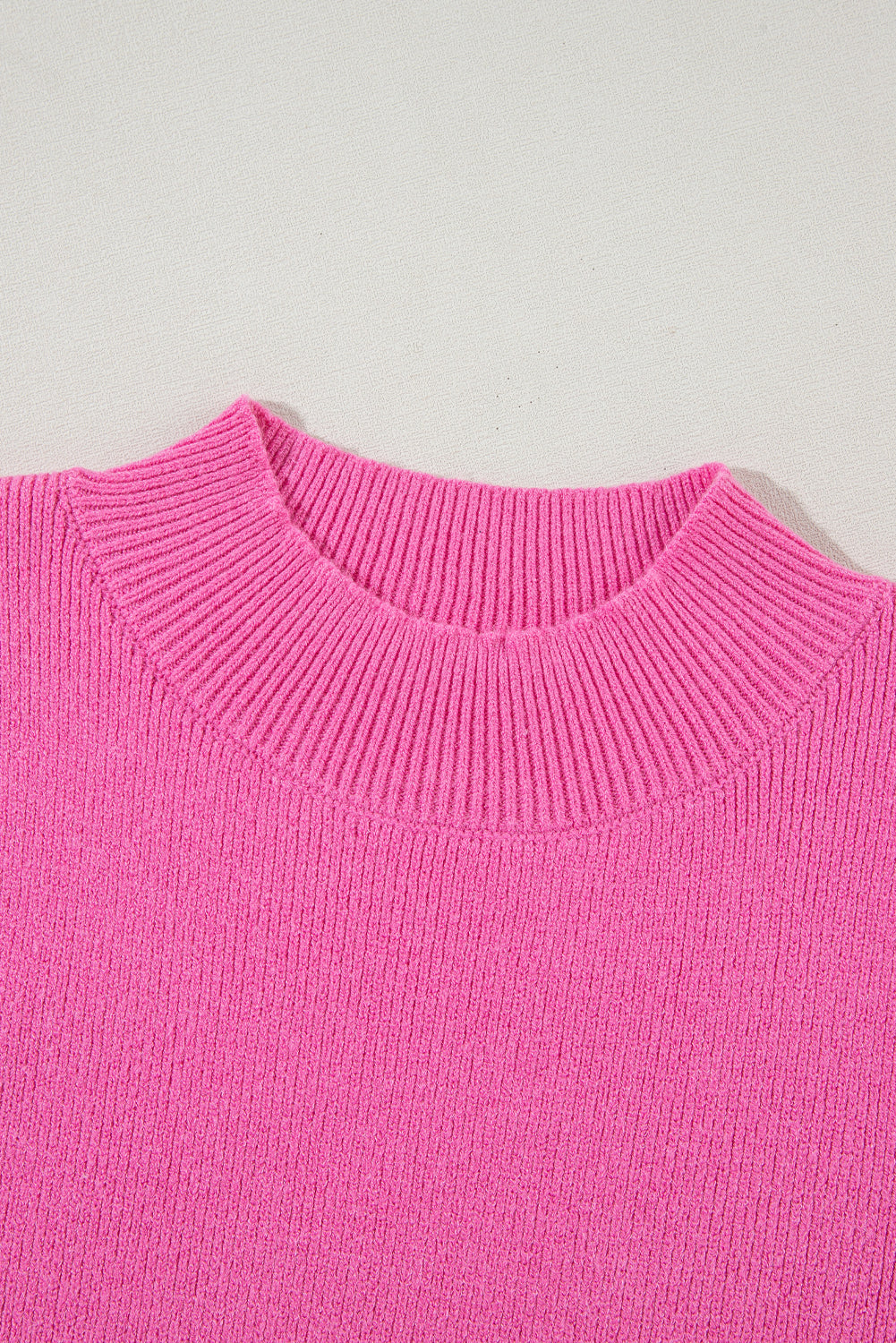 Roze geribbelde gebreide trui met contrasterende mouwen