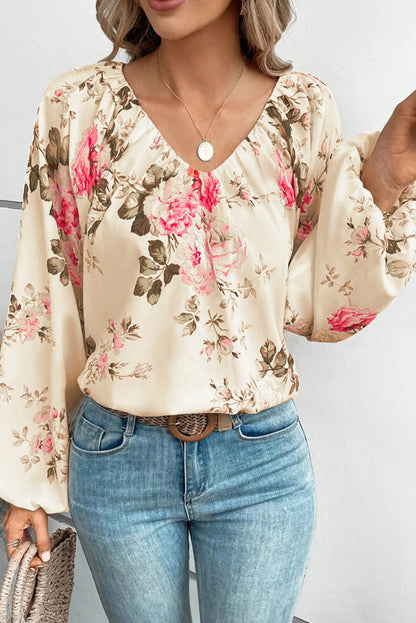 Beige blouse met V-hals met bloemenprint en lantaarnmouwen
