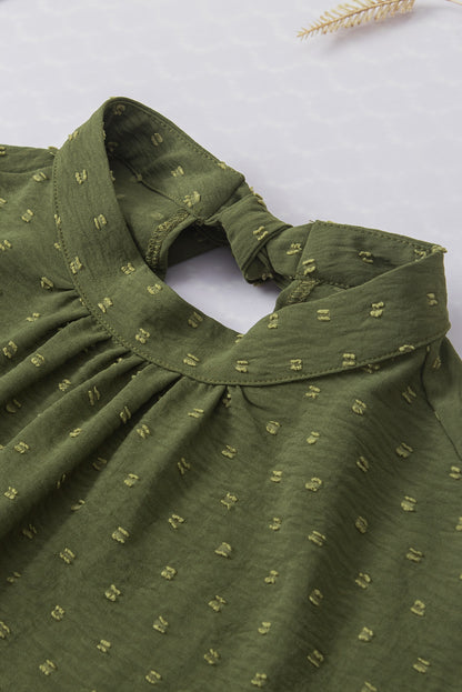 Mistgroene blouse met Zwitserse stippen en vleermuismouwen