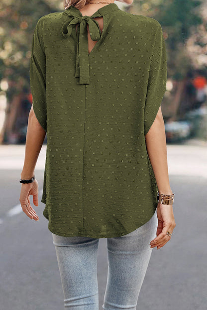Mistgroene blouse met Zwitserse stippen en vleermuismouwen