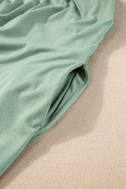 Grasgroene maxi-T-shirtjurk met V-hals en verborgen zaksplitten